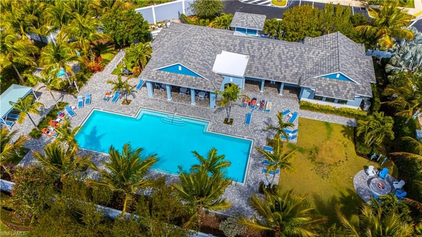 Community pool featuring patio