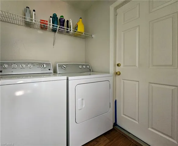 LAUNDRY ROOM NEXT TO GARAGE DOOR