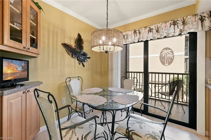 Dining area in kitchen with screened lanai