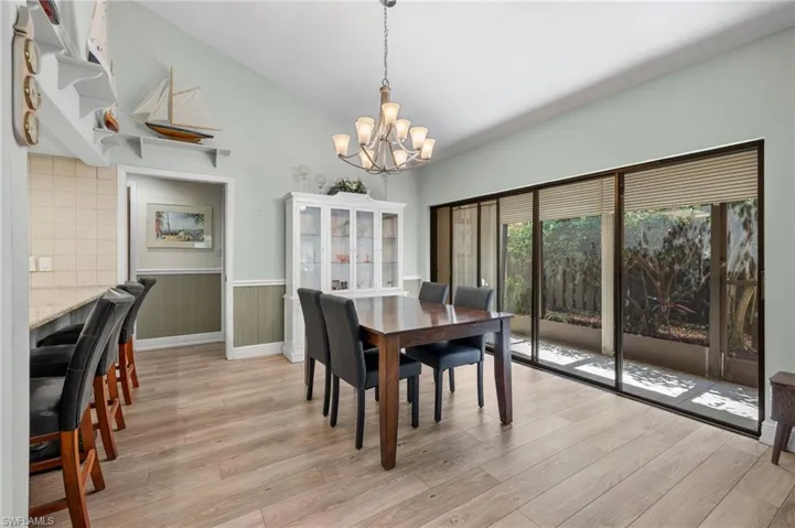 Dining area with attached screened lanai