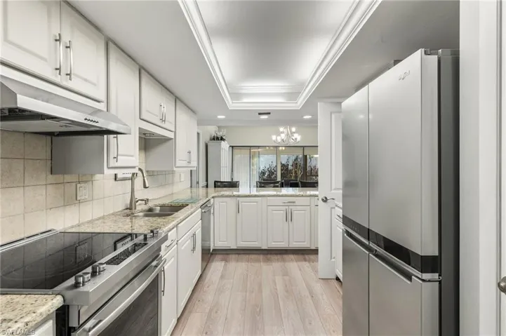 Beautiful white cabinetry with new Stainless Steel Appliances