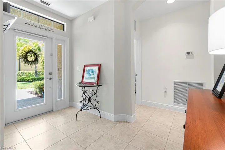 BEAUTIFUL FOYER ENTRYWAY TO YOUR FUTURE HOME! PREPARE TO BE WOWED! PLUS THE PEACE OF MIND WITH IMPACT RESISTANT WINDOWS & DOORS!