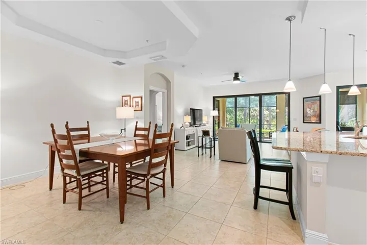 LARGE DINING ROOM AREA FOR FAMILY & FRIENDS TO ENJOY! NOTE THE BEAUTIFUL COFFERED CEILING!