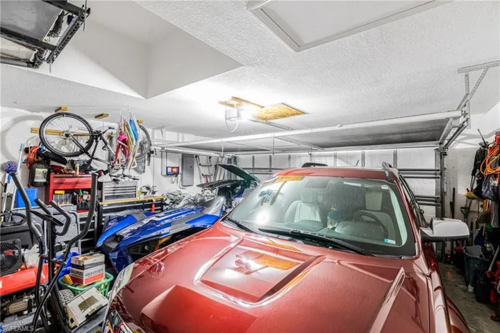 Garage featuring electric panel