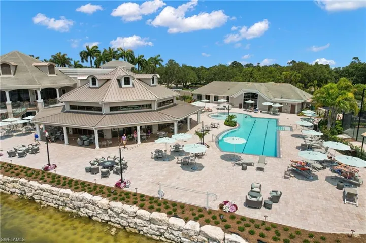 View of pool with a patio, a gazebo, and a water view