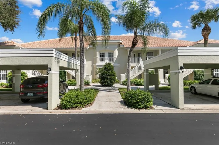 View of front of property featuring a carport