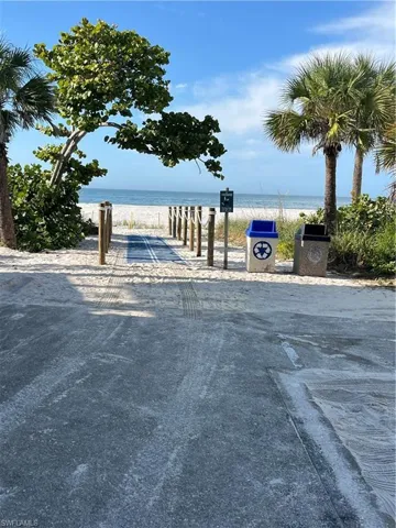 View of road featuring view of water and beach