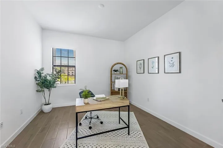 Office space featuring hardwood / wood-style flooring