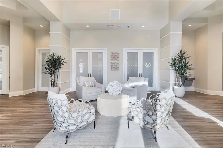 Living room featuring hardwood / wood-style flooring and french doors