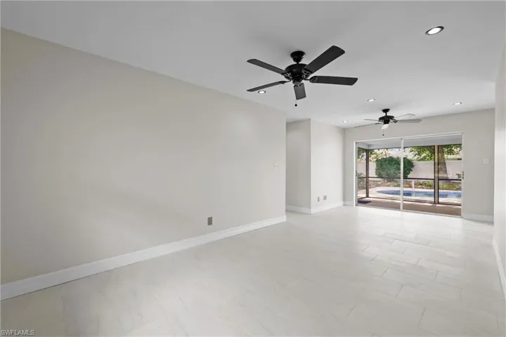 Spare room with ceiling fan and recessed lighting