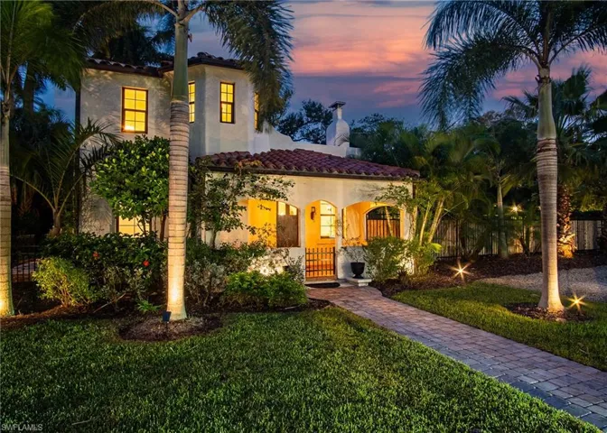 Mediterranean / spanish-style home featuring a yard