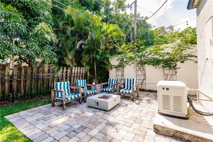 View of patio featuring a fire pit