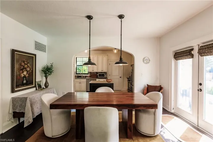 Dining space featuring light hardwood / wood-style floors and sink