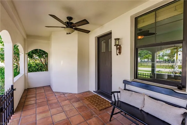 Entrance to property with ceiling fan