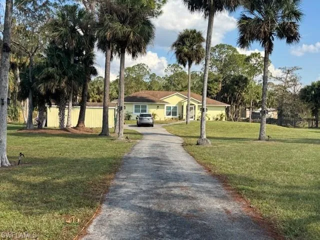 View of front facade with a front lawn