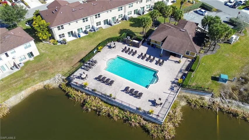 Bird's eye view of a large body of water and a pool area