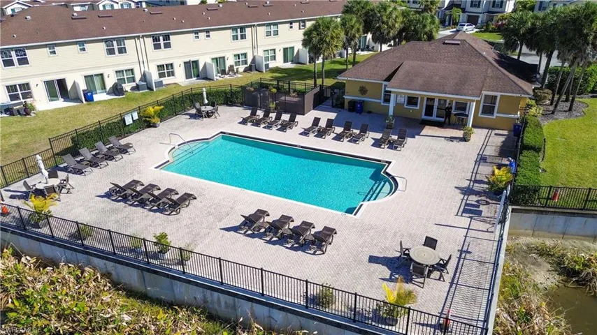 Community pool featuring a patio area