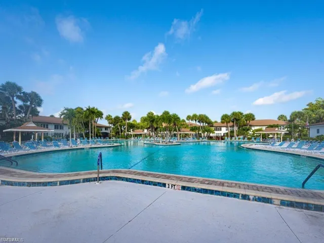Community pool with a patio and a gazebo
