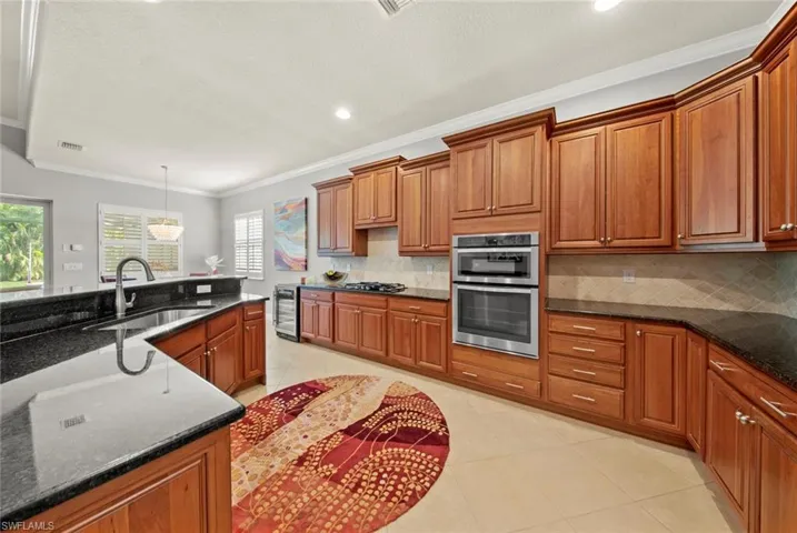 Upgraded cabinets, Granite counter tops, tile backsplash