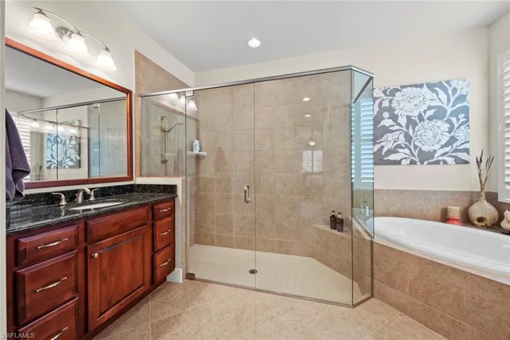 Master en-suite bath w/large shower, separate soaking tub