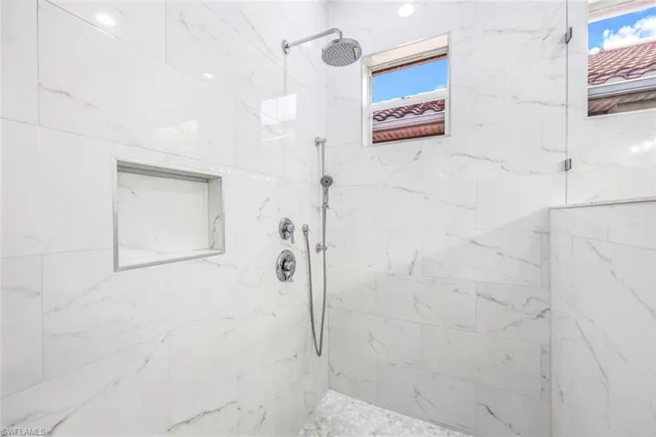 Bathroom with tiled shower