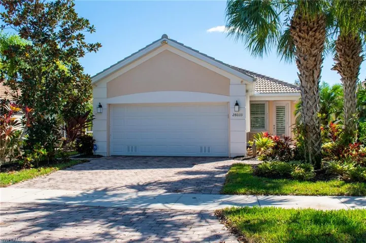 Single story home featuring a garage