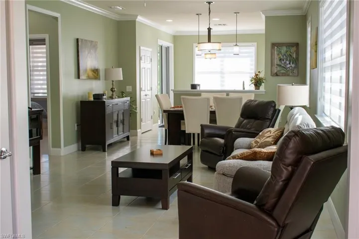 Tiled living room with ornamental molding