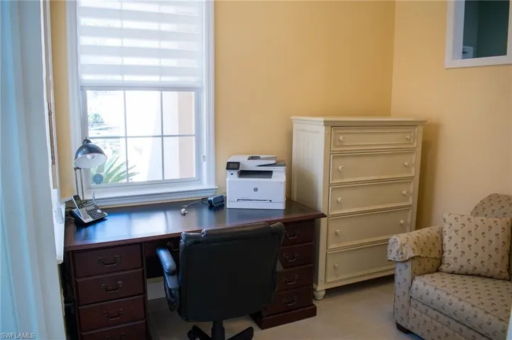 Office featuring light tile patterned floors