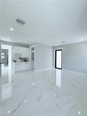 Unfurnished room with a wealth of natural light