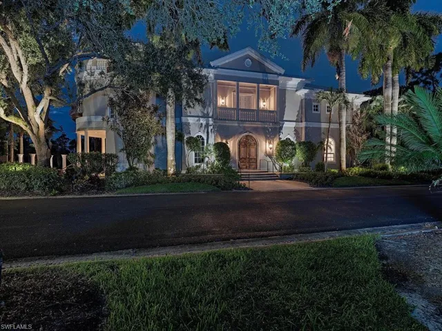 View of front of house featuring a balcony