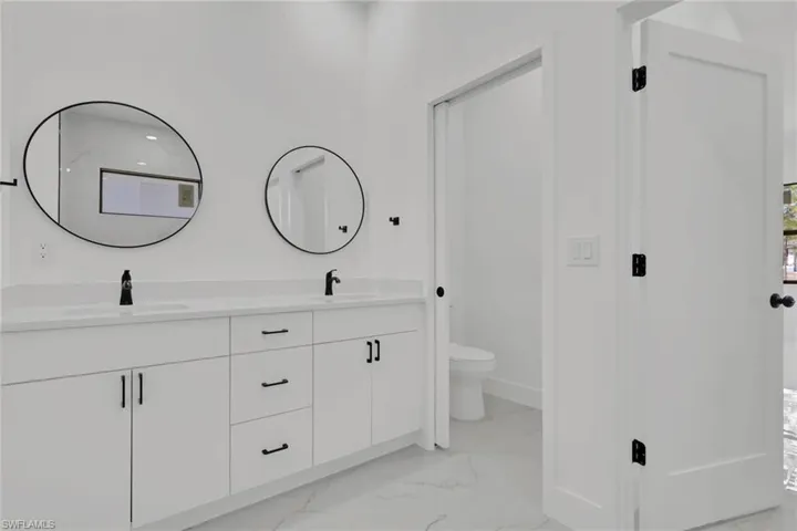 Primary bathroom with dual vanity