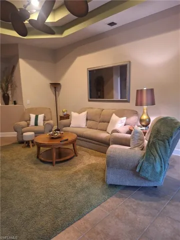 Living room featuring tile patterned flooring