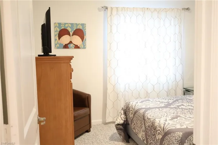 Bedroom with carpet