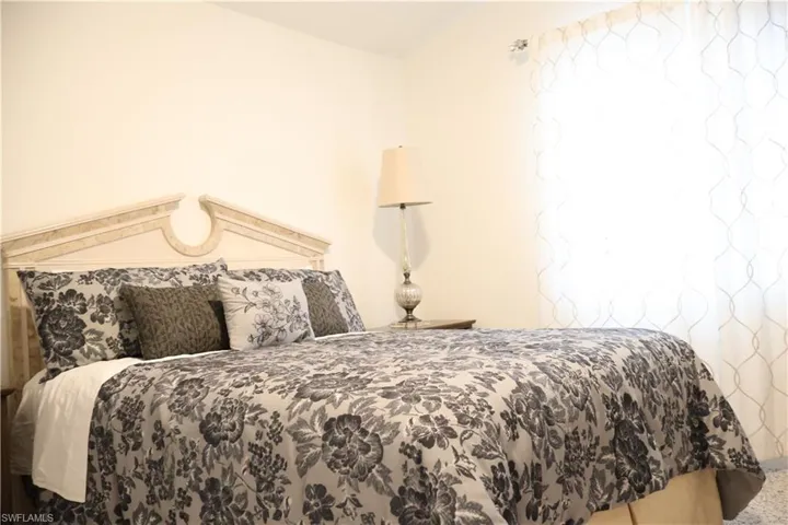 Bedroom with carpet