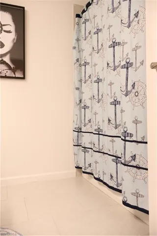 Bathroom featuring tile patterned floors