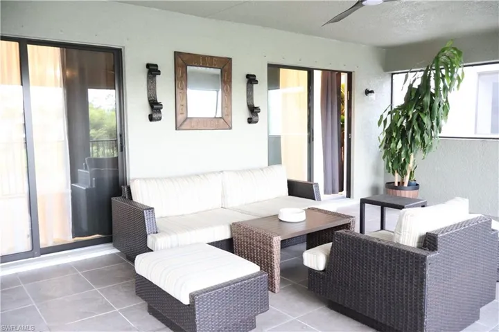 View of patio with a ceiling fan