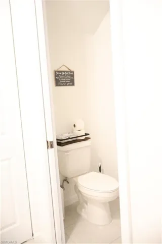 Bathroom with tile patterned floors