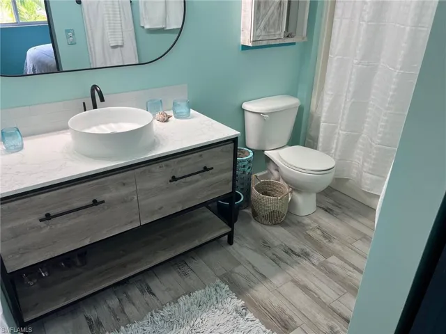 Master bathroom.  Combo tub/shower.  New vanity and flooring, linen closet.