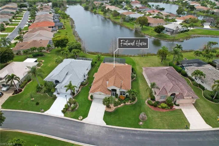 Drone / aerial view featuring a southern extended lake water view