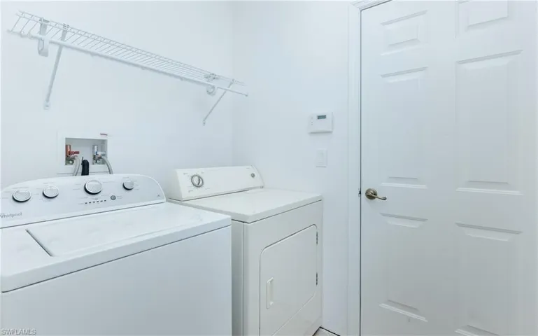 First floor Laundry room with washing machine only. Dryer not included