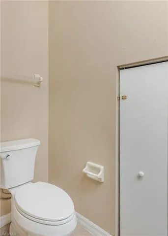 First floor 1/2 Bath with add'l under stairs storage area