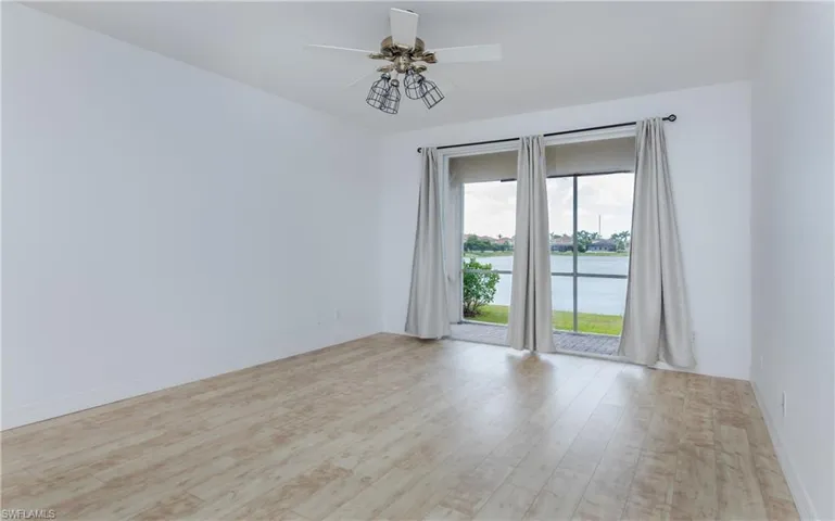 Unfurmished Master bedroom featuring LVP flooring ceiling fan