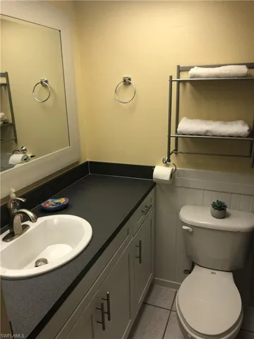 Bathroom with vanity and toilet