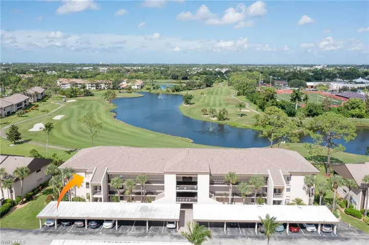 Bird's eye view of a large body of water and a local golf course