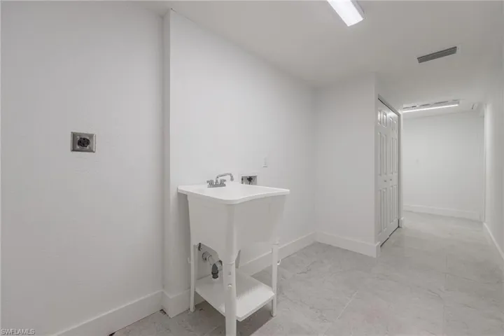 Laundry room with washer hookup and electric dryer hookup