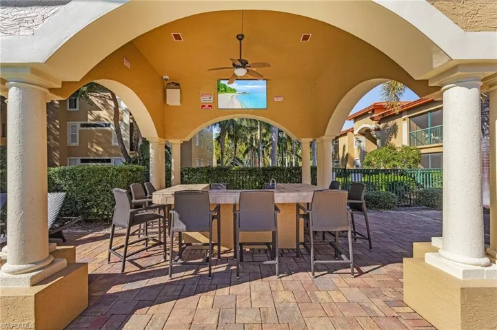 View of patio with a ceiling fan