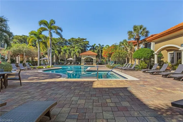 Community pool featuring a gazebo and a patio area