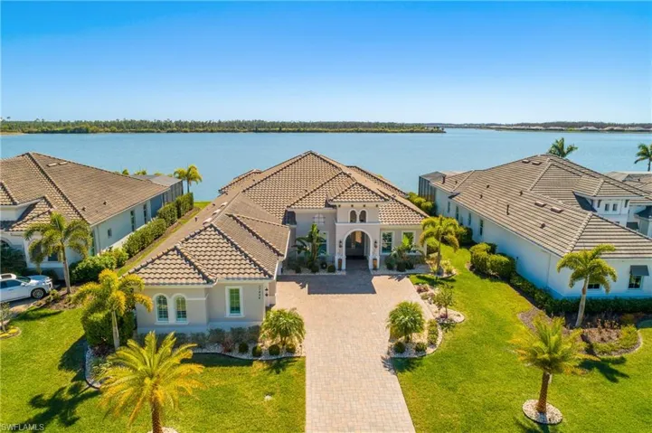 Welcome to 17424 Blue Sapphire Dr.. This stock-built Sterling III floor plan with bonus room offers southern exposure and long lake views with protected preserve in the distance.