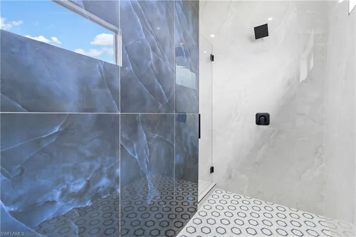 Master Bathroom featuring tiled shower