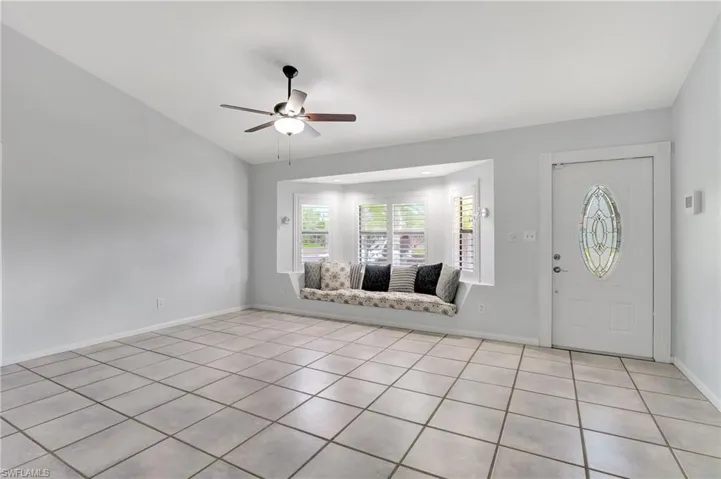 patterned floors, and vaulted ceiling